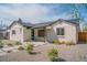 Attractive home with a well-maintained yard and walkway that leads to the front door at 6935 W 16Th Ave, Lakewood, CO 80214