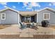 Backyard patio with outdoor seating, bbq, and view of house at 5035 Old Ranch Dr, Longmont, CO 80503