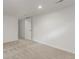 An empty basement room with neutral carpet and white walls at 2026 S Pitkin St, Aurora, CO 80013
