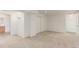 Bedroom with neutral carpet, white walls, and a closet at 2026 S Pitkin St, Aurora, CO 80013