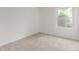 Clean bedroom with carpeted floors and a window with natural light at 2026 S Pitkin St, Aurora, CO 80013