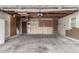 An empty garage with unfinished walls and concrete flooring, ready for customization at 2026 S Pitkin St, Aurora, CO 80013