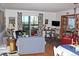 Cozy living room featuring hardwood floors and natural lighting at 13890 E Marina Dr # 605, Aurora, CO 80014