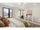 Spacious bedroom with abundant natural light and elegant decor at 2391 King St, Denver, CO 80211