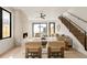 Inviting living room with fireplace, comfortable seating, and seamless transition to open floor plan at 2391 King St, Denver, CO 80211