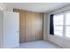 Bedroom with large closet, window, and neutral carpet at 6776 S Holland Way, Littleton, CO 80128