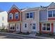 Charming multi-colored townhomes with individual entryways and manicured landscaping at 6776 S Holland Way, Littleton, CO 80128