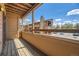 Cozy balcony with wooden railing offers a relaxing outdoor retreat and scenic views at 4691 S Decatur St # 215, Englewood, CO 80110
