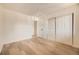 Neutral bedroom with new floors and closet at 4691 S Decatur St # 215, Englewood, CO 80110
