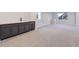 Large finished basement with bar, beverage cooler, and neutral carpet at 5528 Echo Hollow St, Castle Rock, CO 80104