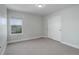 Comfortable bedroom with sliding door closet, soft carpet and a window offering natural light at 5528 Echo Hollow St, Castle Rock, CO 80104