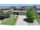 Exterior view of a two-story home with a large driveway, front yard, landscaping, and a welcoming porch at 5528 Echo Hollow St, Castle Rock, CO 80104