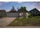 Charming single-story home with a well-maintained front lawn and mature landscaping at 1248 W 135Th Ave, Denver, CO 80234