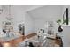 Open concept living room with modern furnishings and bright, natural light at 1248 W 135Th Ave, Denver, CO 80234