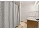 Bathroom featuring a single sink vanity and a shower with a patterned curtain at 5126 S Malaya Way, Centennial, CO 80015