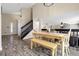 Inviting dining area with natural lighting, wood floors, and stylish decor at 5126 S Malaya Way, Centennial, CO 80015
