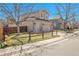 Charming two-story home with an attached two-car garage, and well-maintained lawn at 5126 S Malaya Way, Centennial, CO 80015
