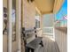 Inviting front porch with a bench and smart lock at 5126 S Malaya Way, Centennial, CO 80015