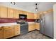 Kitchen with stainless steel appliances and plenty of countertop space at 5126 S Malaya Way, Centennial, CO 80015