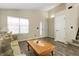 Inviting living room featuring wood floors, neutral walls, and a cozy seating area at 5126 S Malaya Way, Centennial, CO 80015