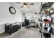 Office space with a work desk, floating shelves, a crib, and natural light at 5126 S Malaya Way, Centennial, CO 80015