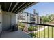 View from the private balcony overlooking community green space and other condominium buildings at 8843 Colorado Blvd # 208, Thornton, CO 80229