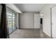 Bedroom featuring sliding glass door to deck and closet at 8843 Colorado Blvd # 208, Thornton, CO 80229
