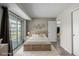Bedroom featuring access to deck and closet at 8843 Colorado Blvd # 208, Thornton, CO 80229