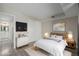 Cozy bedroom with decor, closet, and entry to ensuite bathroom at 8843 Colorado Blvd # 208, Thornton, CO 80229