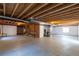 Unfinished basement with exposed ceiling at 24664 E Louisiana Cir, Aurora, CO 80018