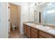 Dual sink bathroom features separate toilet and shower areas at 24664 E Louisiana Cir, Aurora, CO 80018