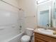 Clean bathroom with a bathtub, shower, and a vanity with sink at 24664 E Louisiana Cir, Aurora, CO 80018