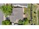 Aerial view showcases the home's layout, roof, backyard deck, landscaping, and proximity to the neighborhood at 9638 Marion Way, Thornton, CO 80229