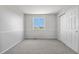 Bright bedroom features a window and closet for storage at 9638 Marion Way, Thornton, CO 80229