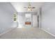 Bright and airy bedroom with neutral carpet and a view of the attached bathroom at 9638 Marion Way, Thornton, CO 80229