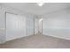 Neutral bedroom with carpet, closet, and white trim at 9638 Marion Way, Thornton, CO 80229