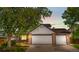 Charming two-car garage with stone accents and lovely curb appeal at 9638 Marion Way, Thornton, CO 80229