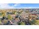 An attractive aerial view of local townhouses and landscape with a scenic mountain view at 185 S Sable Blvd # T18, Aurora, CO 80012