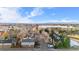 An aerial view of a neighborhood featuring townhomes and a distant view of the shopping center at 185 S Sable Blvd # T18, Aurora, CO 80012