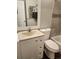 Bathroom featuring a modern vanity and tiled shower-tub combination at 185 S Sable Blvd # T18, Aurora, CO 80012