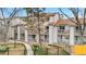 Townhouse complex featuring multiple units with balconies and mature trees at 185 S Sable Blvd # T18, Aurora, CO 80012