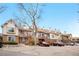 Townhome complex featuring well-maintained exteriors and convenient parking at 185 S Sable Blvd # T18, Aurora, CO 80012