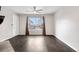 Spacious living room with new floors and large window at 185 S Sable Blvd # T18, Aurora, CO 80012