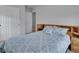 Cozy bedroom with matching wood headboard and side tables at 18938 E 64Th Pl, Denver, CO 80249