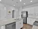 Modern kitchen with stainless steel appliances, granite countertops, and a dishwasher at 18938 E 64Th Pl, Denver, CO 80249