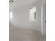 Bright bedroom with neutral carpet and abundant natural light from modern windows at 20520 E 58Th Ave, Aurora, CO 80019