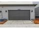 Attached two car garage door with updated features and hardware at 20520 E 58Th Ave, Aurora, CO 80019
