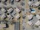 Aerial view of the neighborhood featuring townhomes, streets, basketball court, and a swimming pool at 7946 Chase Cir # 112, Arvada, CO 80003