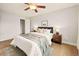 Cozy bedroom features a soft bed, natural light and a ceiling fan at 7946 Chase Cir # 112, Arvada, CO 80003