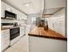 Modern kitchen with stainless steel appliances and white cabinets at 7946 Chase Cir # 112, Arvada, CO 80003